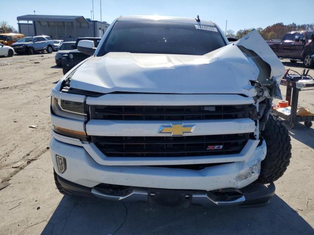 Photo 5 from auction – 2018 CHEVROLET SILVERADO with VIN 3GCUKREC0JG228824