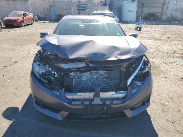 Photo 5 from auction – 2016 HONDA CIVIC EX with VIN 19XFC2F86GE092193