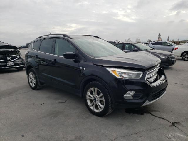 Photo 4 from auction – 2018 FORD ESCAPE SE with VIN 1FMCU0GD6JUA48554