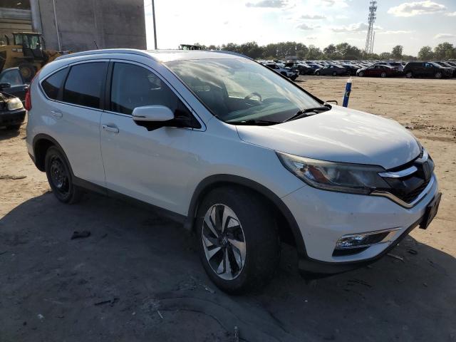 Photo 4 from auction – 2015 HONDA CR-V TOURI with VIN 5J6RM4H94FL070141