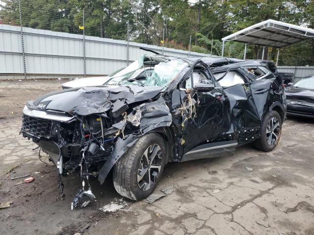 KIA SPORTAGE E 2023 with VIN 5XYK33AFXPG044127 - Photo from auction