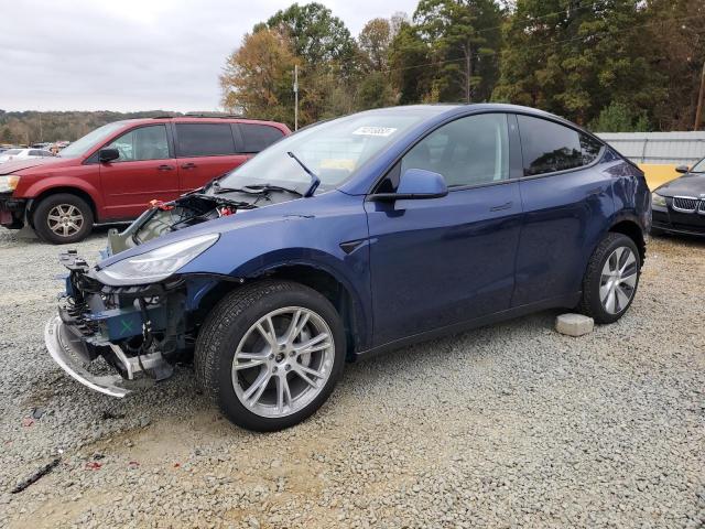 TESLA MODEL Y 2023 with VIN 7SAYGDEE7PA113384 - Photo from auction