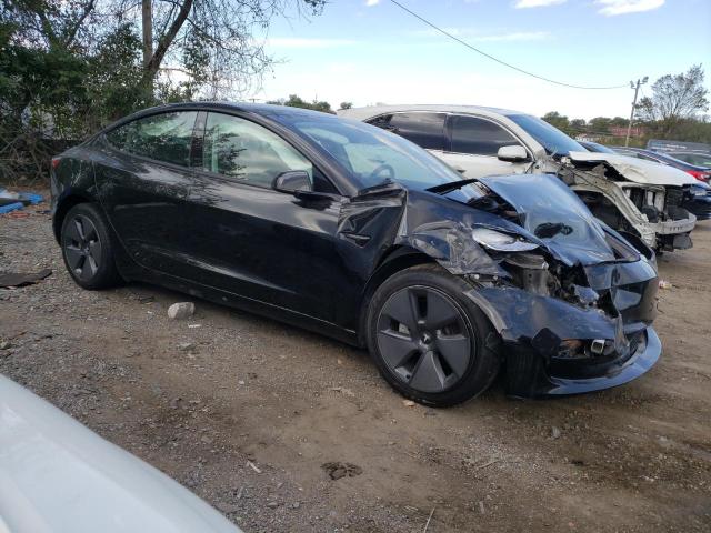 Photo 4 from auction – 2021 TESLA MODEL 3 with VIN 5YJ3E1EA0MF853947