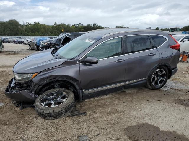 Photo 1 from auction – 2017 HONDA CR-V TOURI with VIN 7FARW1H91HE024985