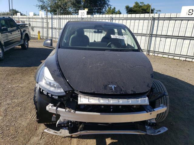 Photo 5 from auction – 2023 TESLA MODEL Y with VIN 7SAYGDEE1PA136532