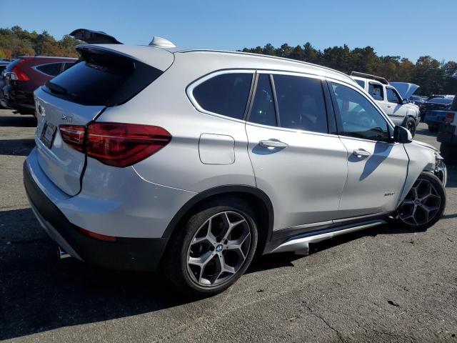 Photo 3 from auction – 2018 BMW X1 XDRIVE2 with VIN WBXHT3C39J5K23758