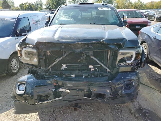 Photo 5 from auction – 2015 GMC SIERRA K25 with VIN 1GT120E88FF657423