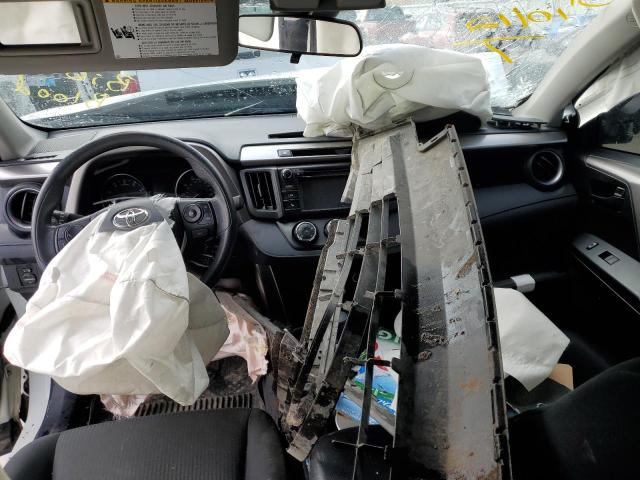 Photo 8 from auction – 2018 TOYOTA RAV4 LE with VIN JTMBFREV5JJ213974