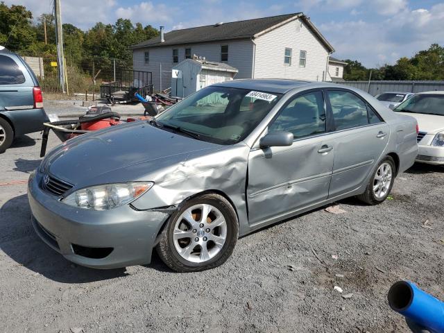 TOYOTA CAMRY LE 2005 with VIN 4T1BE30K35U590834 - Photo from auction