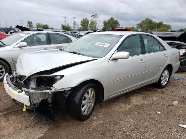 TOYOTA CAMRY LE 2003 with VIN 4T1BE30K93U776522 - Photo from auction