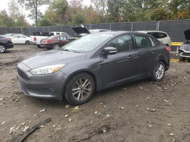 FORD FOCUS SE 2016 with VIN 1FADP3F21GL402907 - Photo from auction
