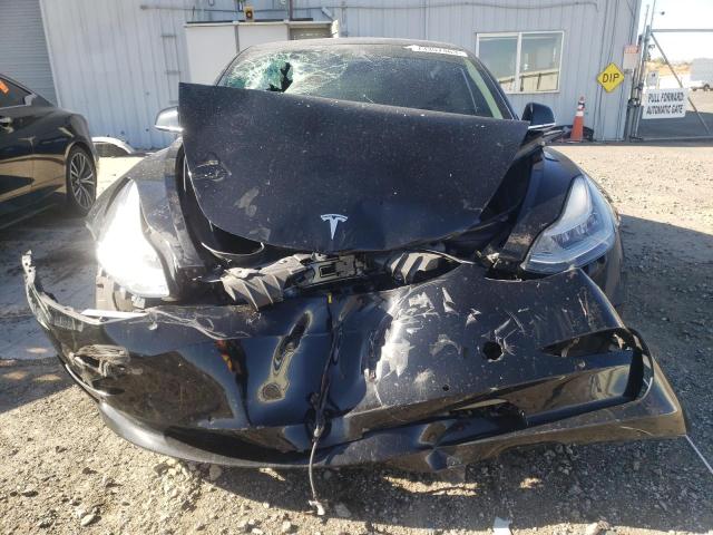 Photo 5 from auction – 2019 TESLA MODEL 3 with VIN 5YJ3E1EB5KF385302