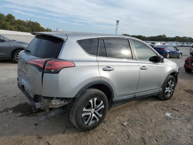 Photo 3 from auction – 2018 TOYOTA RAV4 LE with VIN 2T3ZFREV6JW463790