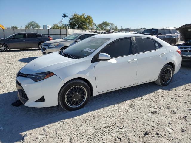 TOYOTA COROLLA L 2018 with VIN 5YFBURHE6JP831477 - Photo from auction