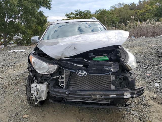 Photo 5 from auction – 2012 HYUNDAI TUCSON GLS with VIN KM8JUCAC6CU335940