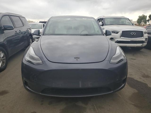Photo 5 from auction – 2023 TESLA MODEL Y with VIN 7SAYGDEF1PF665054