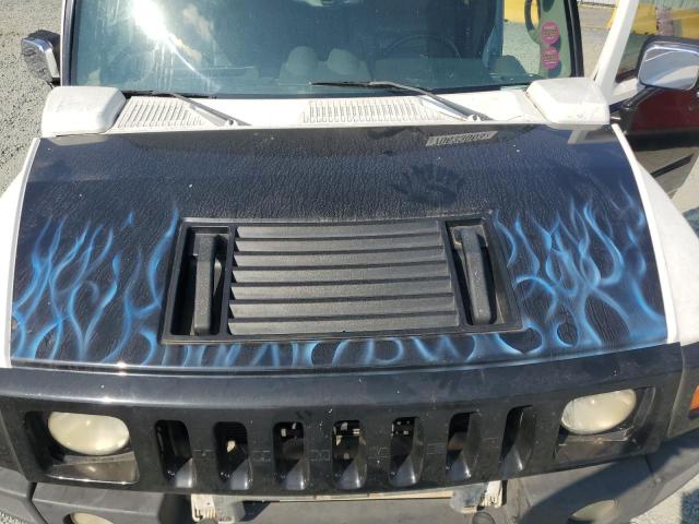 Фото 11 с аукциона – 2003 HUMMER H2 с VIN 5GRGN23U53H123839