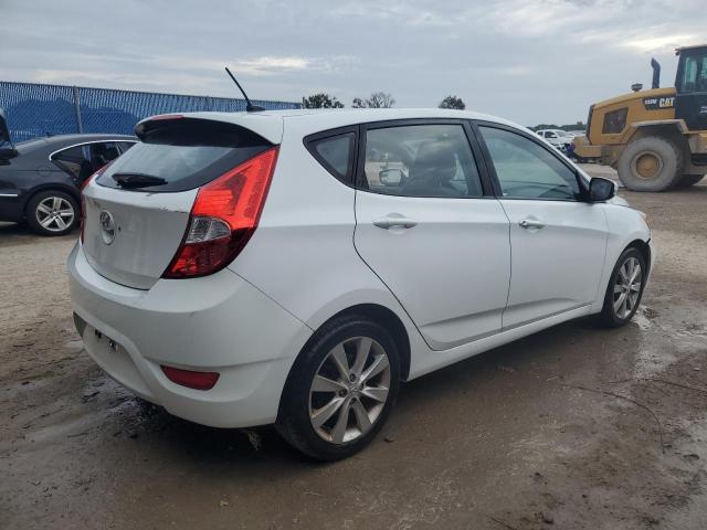 Photo 3 from auction – 2014 HYUNDAI ACCENT GLS with VIN KMHCU5AEXEU166983