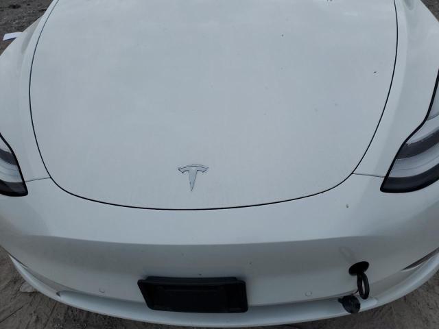 Photo 11 from auction – 2021 TESLA MODEL Y with VIN 5YJYGDEE4MF249743