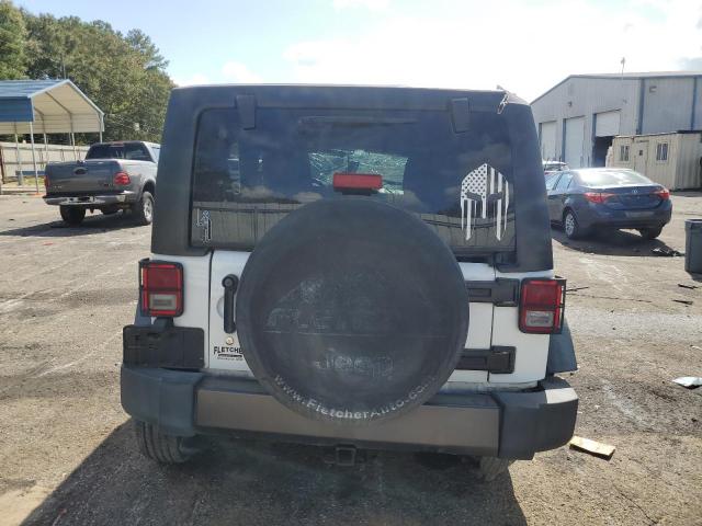 Photo 6 from auction – 2016 JEEP WRANGLER U with VIN 1C4BJWDG2GL142228