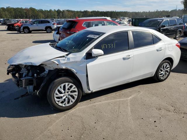 TOYOTA COROLLA L 2018 with VIN 5YFBURHE7JP823470 - Photo from auction