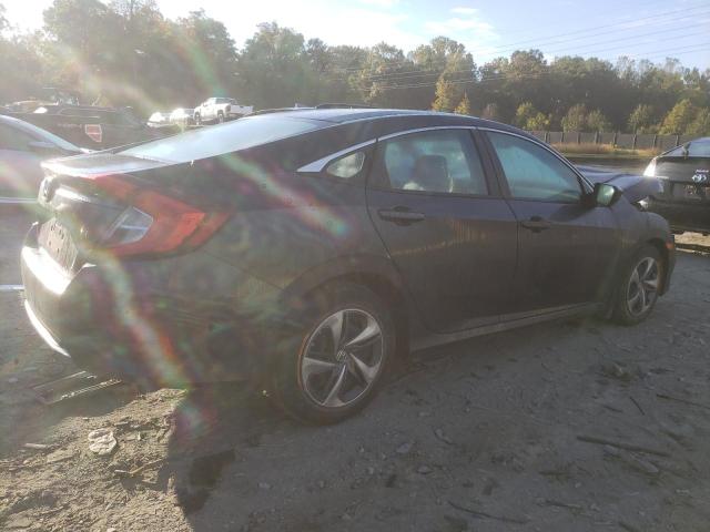 Photo 3 from auction – 2019 HONDA CIVIC LX with VIN 2HGFC2F65KH572061