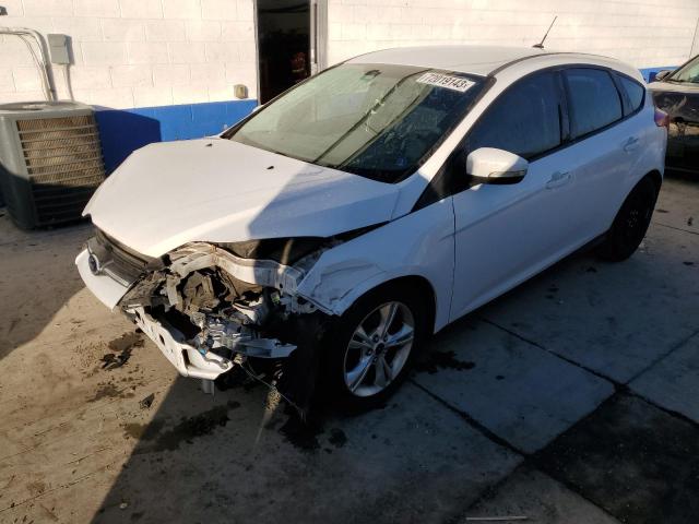 FORD FOCUS SE 2014 with VIN 1FADP3K29EL239667 - Photo from auction