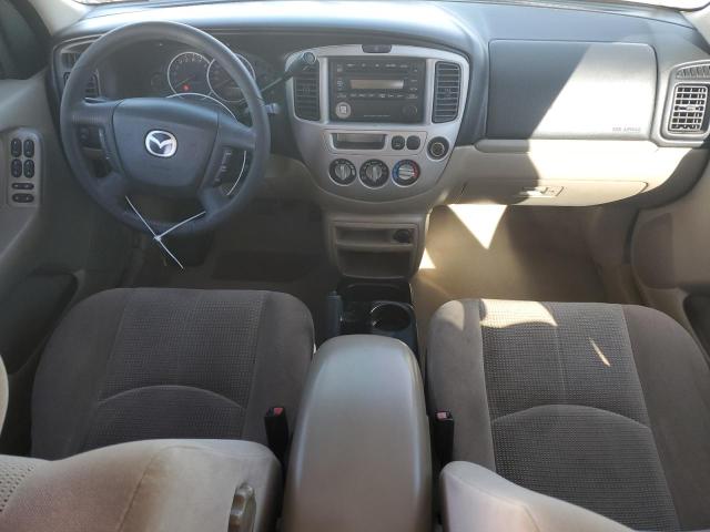 Photo 8 from auction – 2003 MAZDA TRIBUTE LX with VIN 4F2YZ04123KM54898