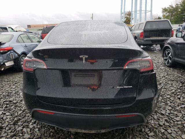 Photo 6 from auction – 2022 TESLA MODEL Y with VIN 7SAYGAEE9NF466949