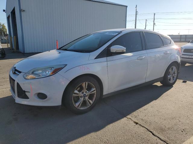 FORD FOCUS SE 2014 with VIN 1FADP3K26EL332128 - Photo from auction