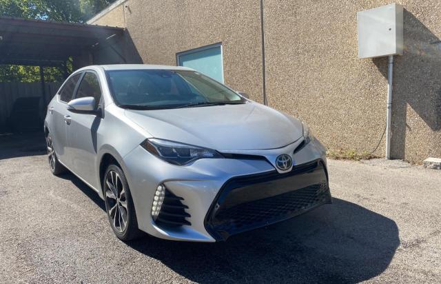 TOYOTA COROLLA L 2019 with VIN 5YFBURHE7KP907371 - Photo from auction