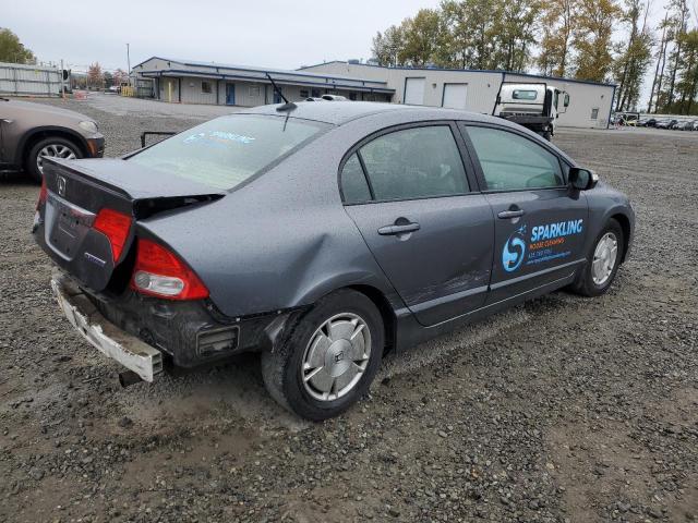Photo 3 from auction – 2010 HONDA CIVIC HYBR with VIN JHMFA3F29AS003601