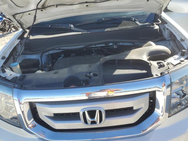 Фото 12 с аукциона – 2011 HONDA PILOT TOUR с VIN 5FNYF4H94BB004973