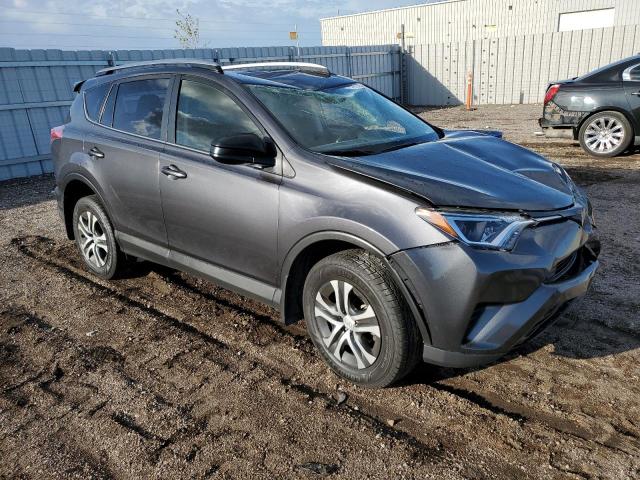 Photo 4 from auction – 2018 TOYOTA RAV4 LE with VIN JTMBFREV1JJ224079