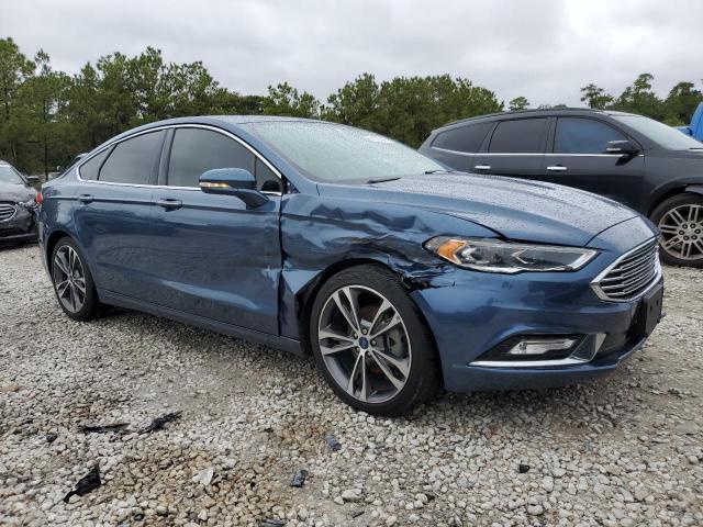 Photo 4 from auction – 2018 FORD FUSION TIT with VIN 3FA6P0K99JR174643