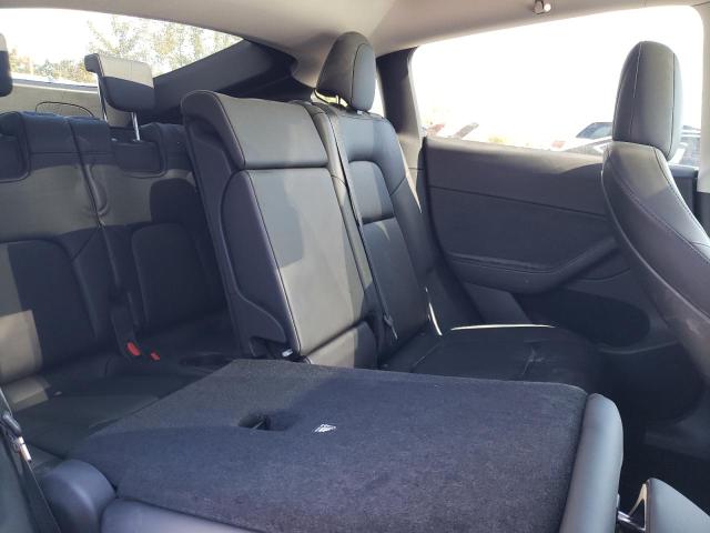 Photo 11 from auction – 2023 TESLA MODEL Y with VIN 7SAYGAEE0PF632830