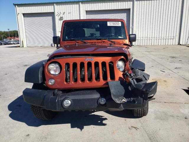 Photo 5 from auction – 2014 JEEP WRANGLER U with VIN 1C4BJWFG6EL248112