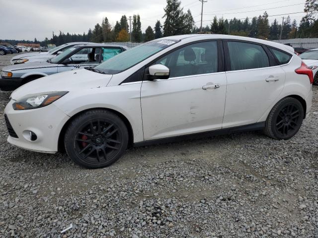 FORD FOCUS TITA 2012 with VIN 1FAHP3N29CL337351 - Photo from auction