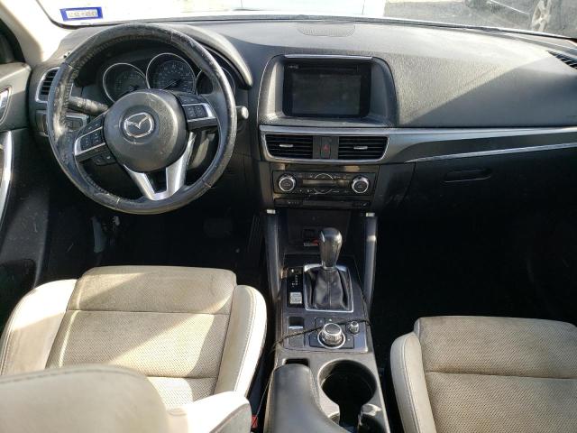 Photo 8 from auction – 2016 MAZDA CX-5 GT with VIN JM3KE2DY7G0919212