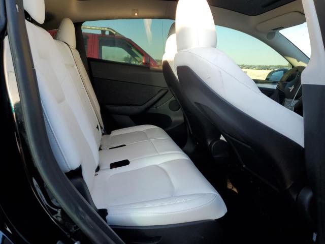 Photo 10 from auction – 2023 TESLA MODEL Y with VIN 7SAYGAEE1PF751082