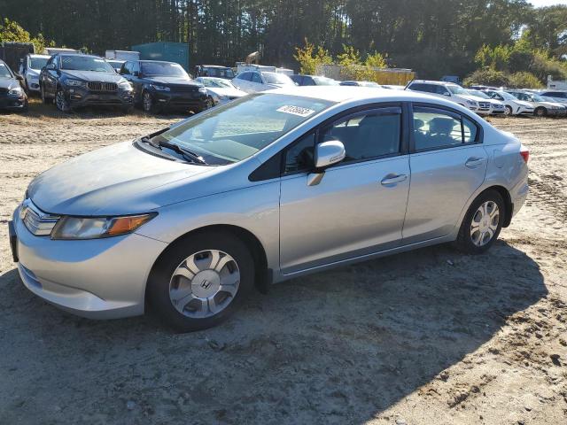 HONDA CIVIC HYBR 2012 with VIN JHMFB4F31CS003476 - Photo from auction