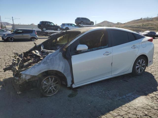 TOYOTA PRIUS PRIM 2018 with VIN JTDKARFP1J3102664 - Photo from auction