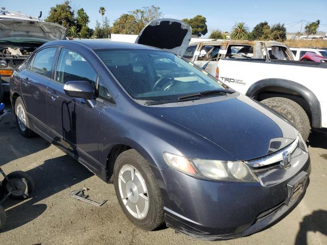 Photo 4 from auction – 2007 HONDA CIVIC HYBR with VIN JHMFA36277S031289