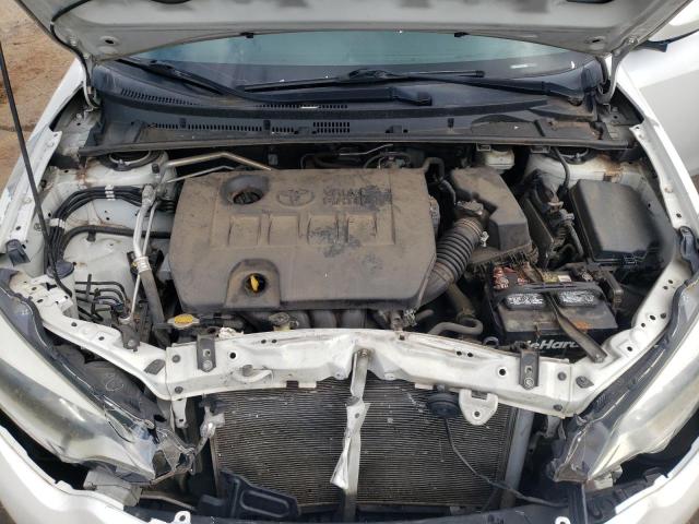 Photo 11 from auction – 2014 TOYOTA COROLLA EC with VIN 5YFBPRHE7EP041778