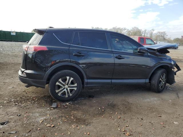 Photo 3 from auction – 2018 TOYOTA RAV4 LE with VIN 2T3BFREV6JW746742