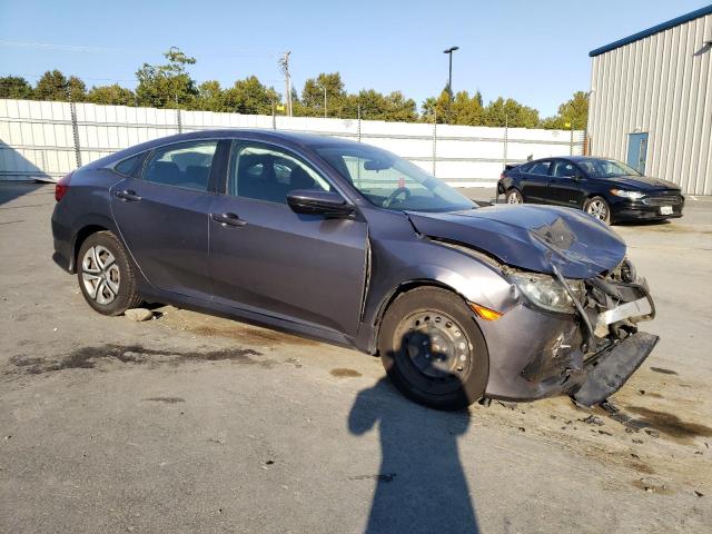 Photo 4 from auction – 2018 HONDA CIVIC LX with VIN 19XFC2F52JE201083