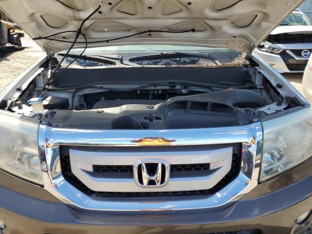 Photo 12 from auction – 2011 HONDA PILOT TOUR with VIN 5FNYF4H92BB063455