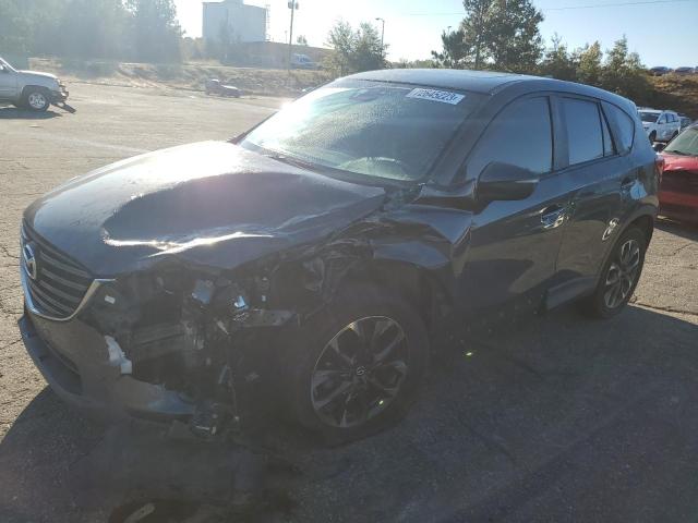 MAZDA CX-5 GT 2016 with VIN JM3KE2DY9G0918918 - Photo from auction