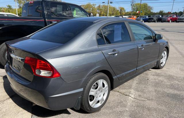 Photo 4 from auction – 2011 HONDA CIVIC LX with VIN 19XFA1F50BE031646