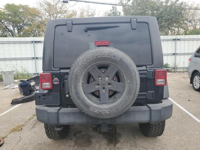 Photo 6 from auction – 2011 JEEP WRANGLER U with VIN 1J4BA3H11BL604009
